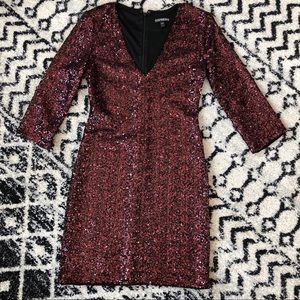 Express red/black sequined long sleeve dress.